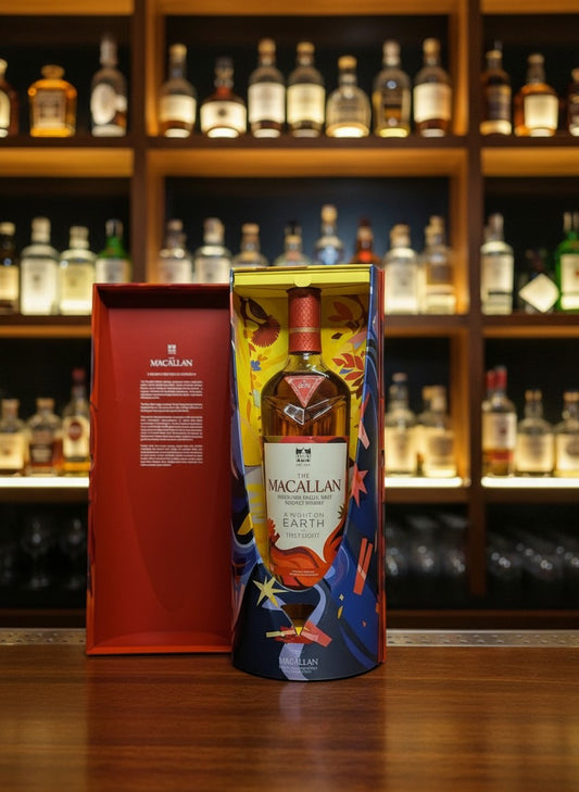 Whiskyquartier presents The Macallan A Night on Earth The First Light 2025 single malt Scotch whisky in a colourful gift box.
